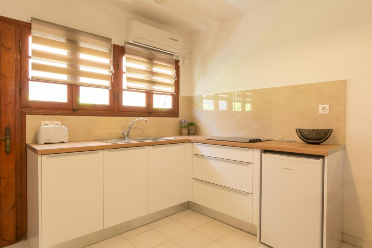 Ferienwohnung Roys Blu Kávos Exterior foto
